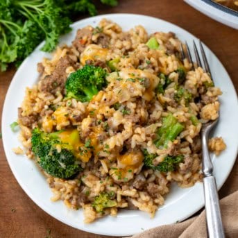 Plate of Beef Broccoli and Rice Skillet with melted cheese.