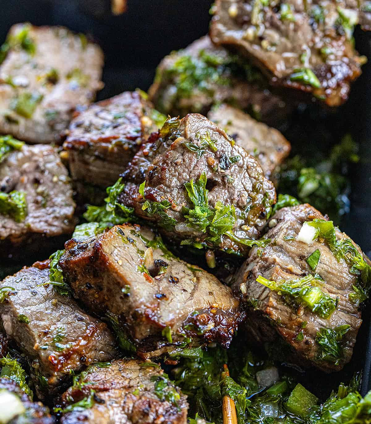 Close up of Chimichurri Steak Skewers with the meat off the skewer.