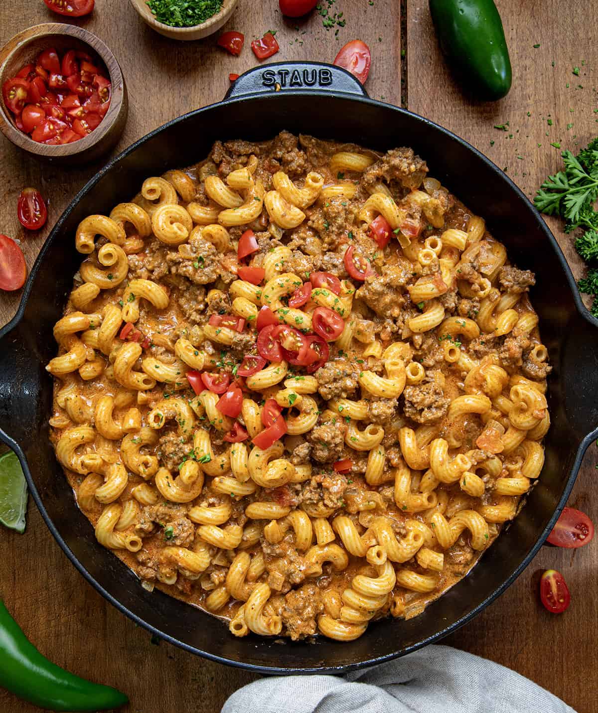 Skillet of Rotel Pasta Fiesta on a wooden table from overhead.
