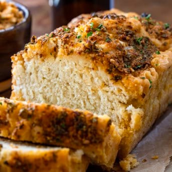 Close up of a loaf of Cowboy Butter Beer Bread that has been cut into.
