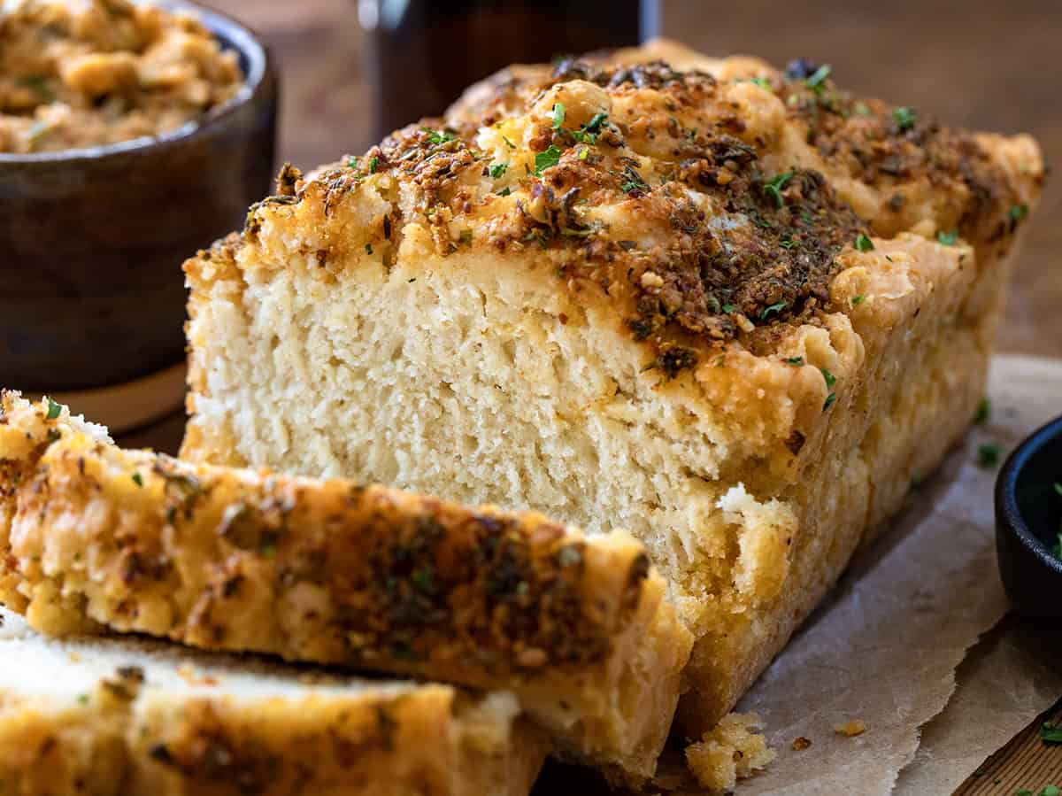 Close up of a loaf of Cowboy Butter Beer Bread that has been cut into.