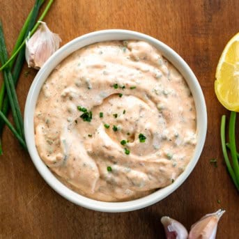 Bowl of Cowboy Mayo on a wooden table from overhead.