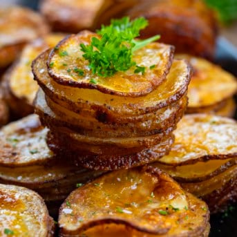 Stack of Crispy Potato Stacks on top of other stacks close up.