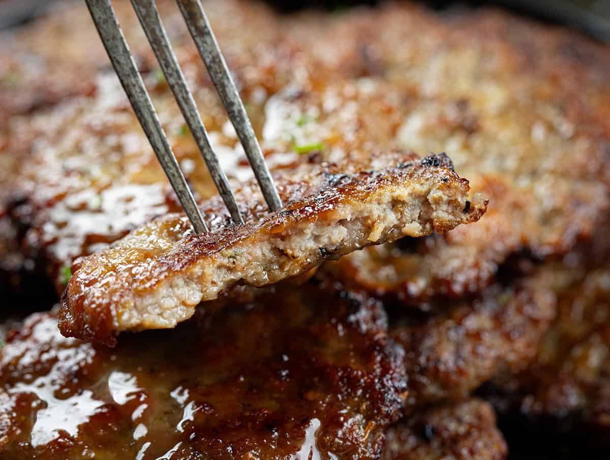Piece of Maple Breakfast Sausage that has been bit into and is on the fork.