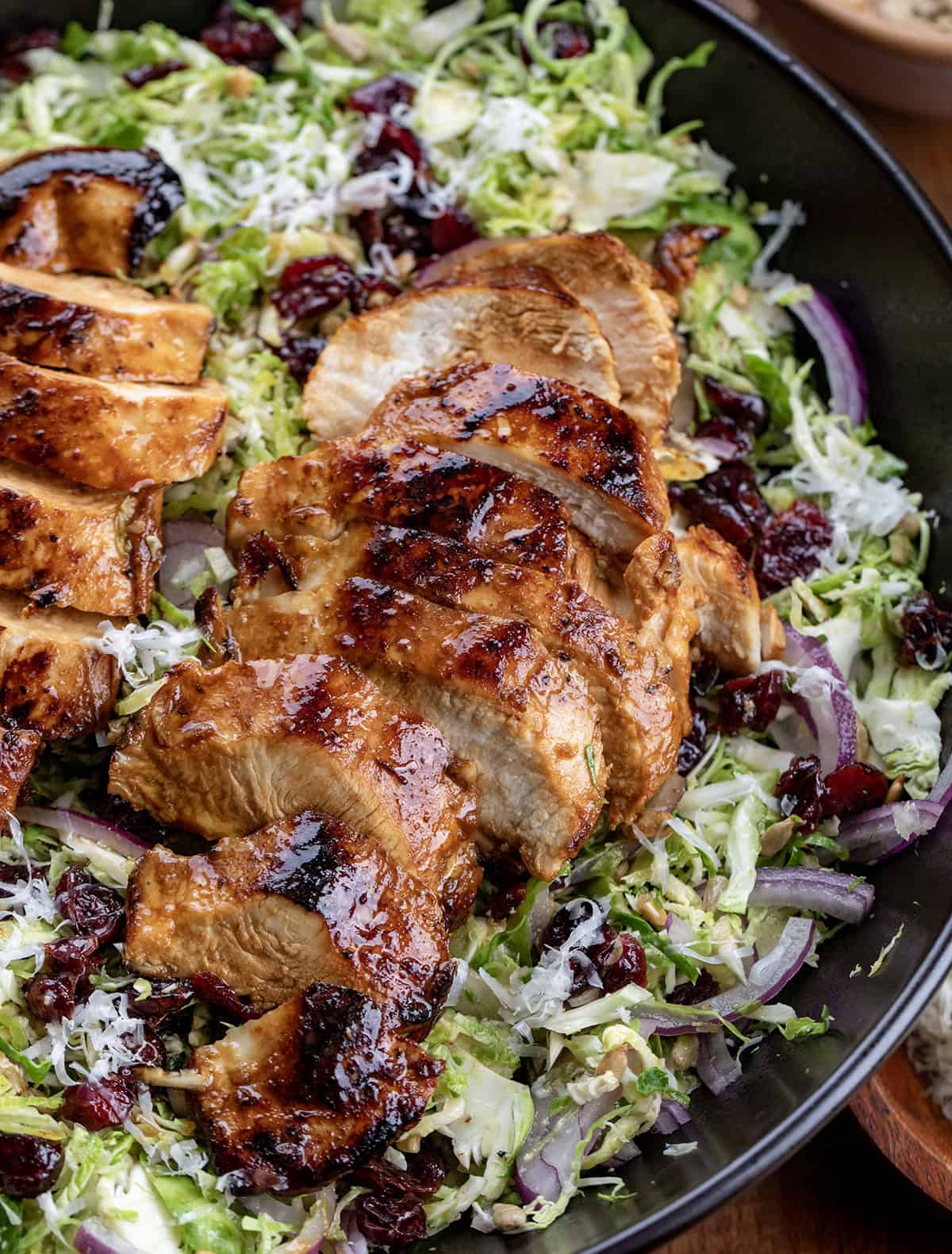Close up of grilled chicken on a Chicken Brussels Sprout Salad.