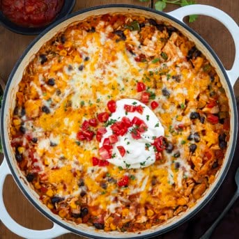 Southwest Chicken Skillet on a wooden table from overhead.