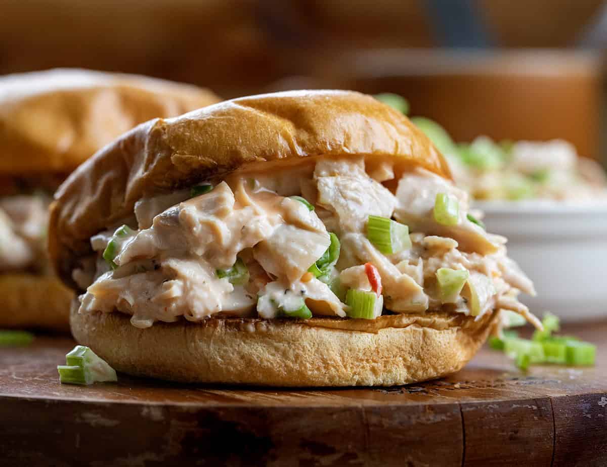 This Bang Bang Chicken Salad is creamy, slightly spicy, and ready in just minutes, perfect for a quick lunch, light dinner, or game-day spread! Close up of a Bang Bang Chicken Salad sandwich.