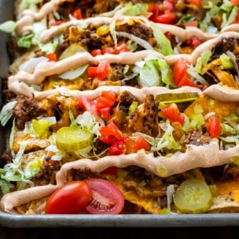 Close up of a pan of Cheeseburger Nachos.