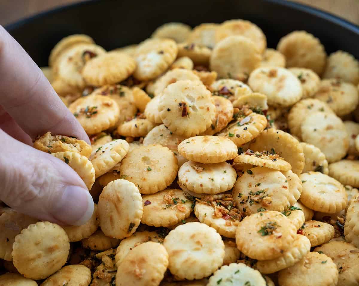 If you’re looking for a quick, flavorful snack that’s perfect for game day, parties, or just munching on while watching your favorite show, these Cowboy Butter Oyster Crackers are exactly what you need. Coated in my signature Cowboy Butter seasoning mix, they’re buttery, savory, and packed with bold flavor! Hand picking up some Cowboy Butter Oyster Crackers.
