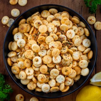 Black bowl filled with Cowboy Butter Oyster Crackers.