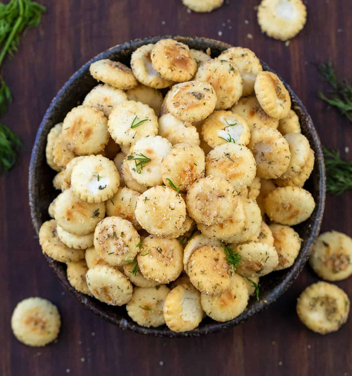 Ranch Oyster Crackers are a simple, savory snack made with pantry staples and baked low and slow for the perfect crunch! Coated in ranch seasoning, garlic, onion, and a hint of dill, these crackers turn golden and crisp as they cool.