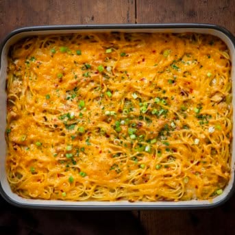 Pan of Cajun Chicken Spaghetti on a wooden table from overhead.