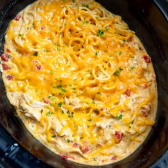 Close up of Cheesy Chicken Spaghetti in the slow cooker.