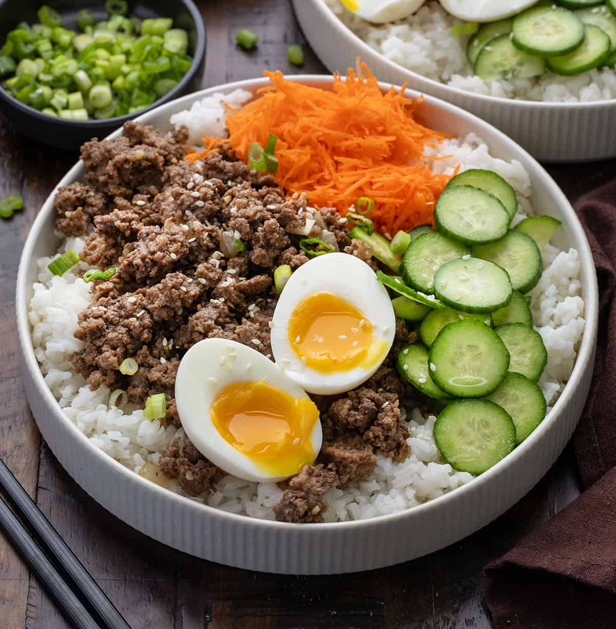 Ground Beef Bulgogi Bowls on a wooden table.