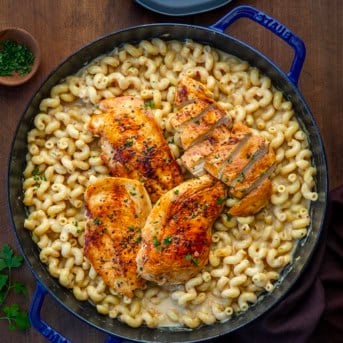White Cheddar Ranch Chicken Pasta on a wooden table from overhead.