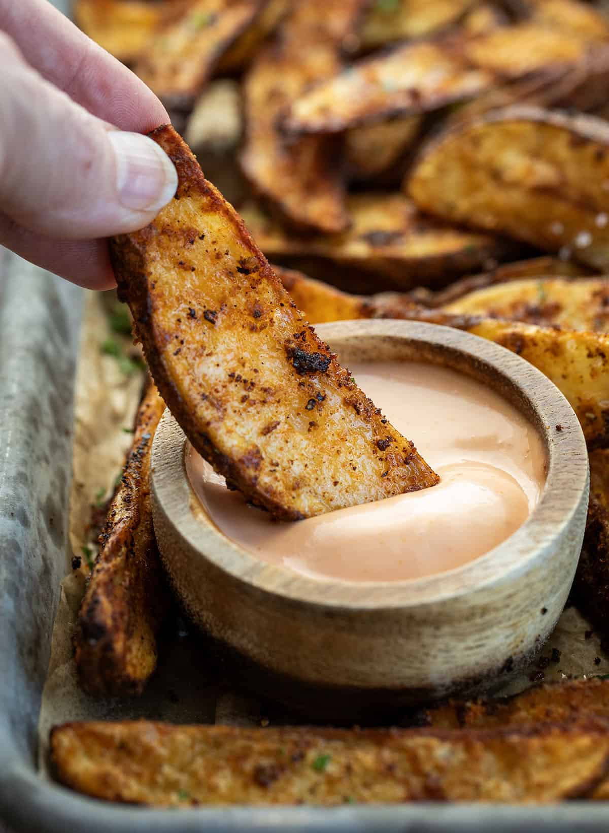 Dipping a Crispy Potato Wedge