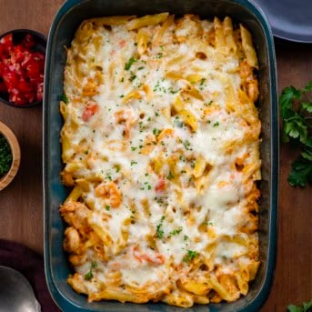 Pan of Seafood Pasta Bake on a wooden table from overhead.
