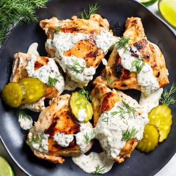 Black plate with Dill Pickle Ranch Chicken on it from overhead.