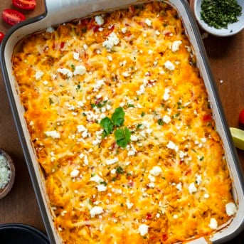 Street Corn Chicken Casserole on a wooden table from overhead.