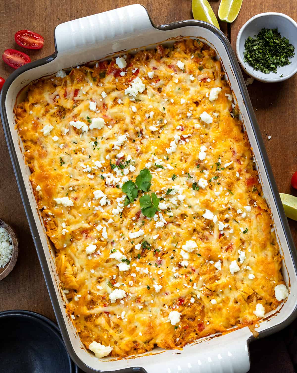 Street Corn Chicken Casserole on a wooden table from overhead Street Corn Chicken Casserole on a wooden table from overhead.
