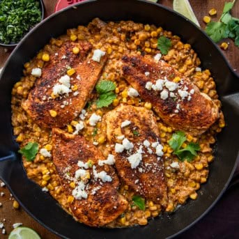 Street Corn Chicken Skillet on a wooden table from overhead.