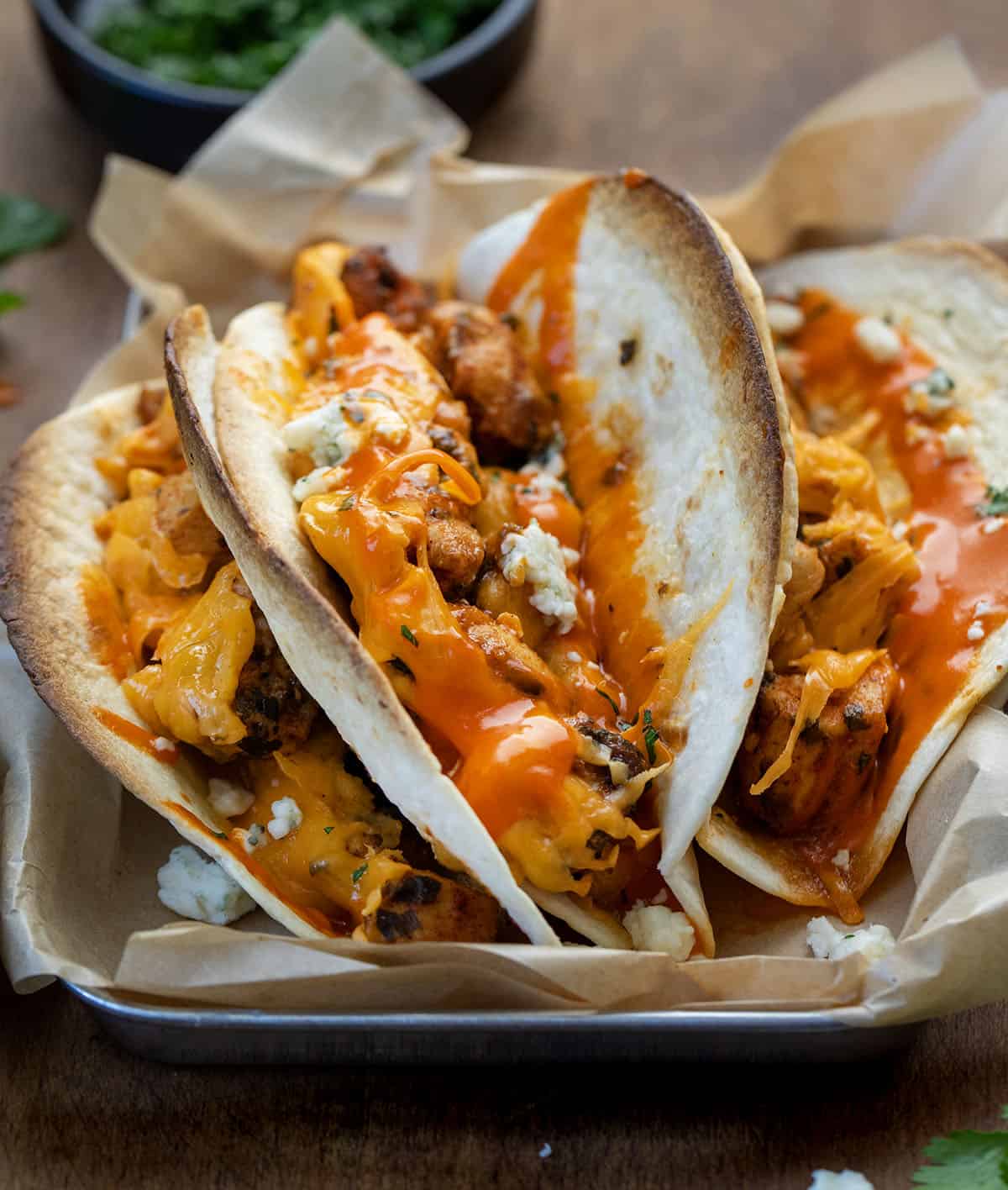 Close up of Baked Buffalo Chicken Tacos Close up of Baked Buffalo Chicken Tacos.