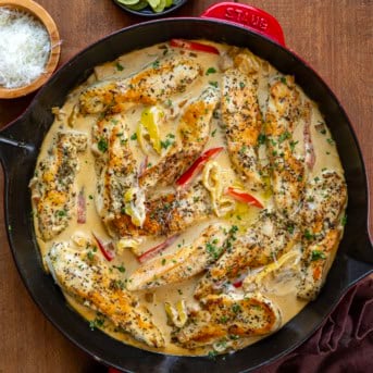 Creamy Pepperoncini Chicken Skillet on a wooden table from overhead.